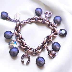 Gorgeous vintage Sade Jewellery charm bracelet